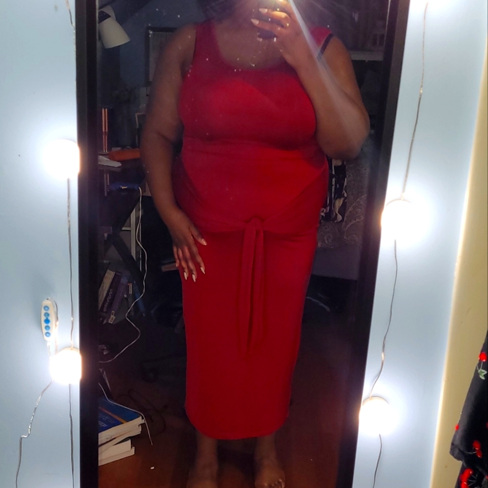 Red cropped tank top and matching knotted skirt
